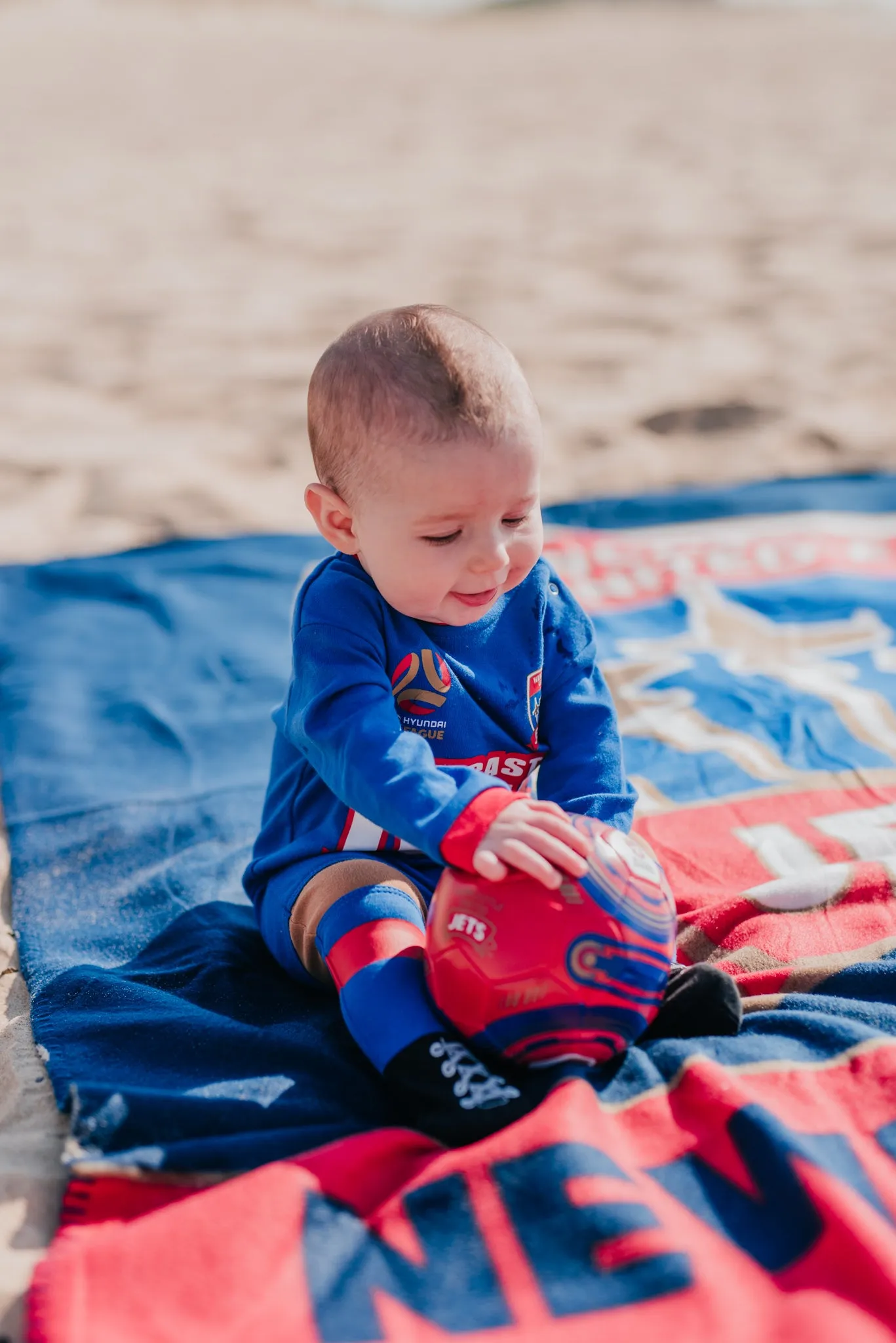 NEWCASTLE JETS FOOTYSUIT - INFANT YOUTH